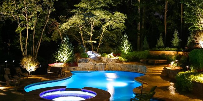 Custom Landscaping with pool and outdoor lighting